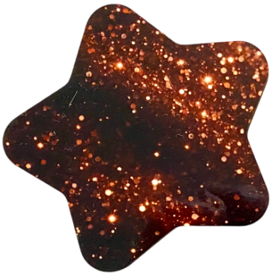 Sternförmiger Glitzer mit orangefarbenen und goldenen Farbtönen.