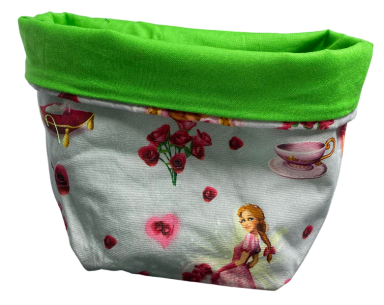 Brauner Stoffbeutel mit grüner Oberkante und buntem, rosa-musterndem Design.