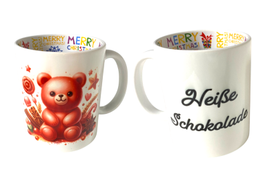 Tasse mit einem Bärenmotiv und der Aufschrift "Heiße Schokolade" innen.