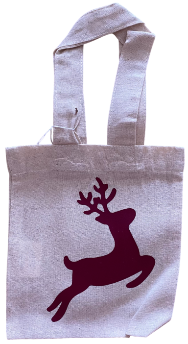 Beige Stofftasche mit rotem Rentiermotiv und zwei Griffen.